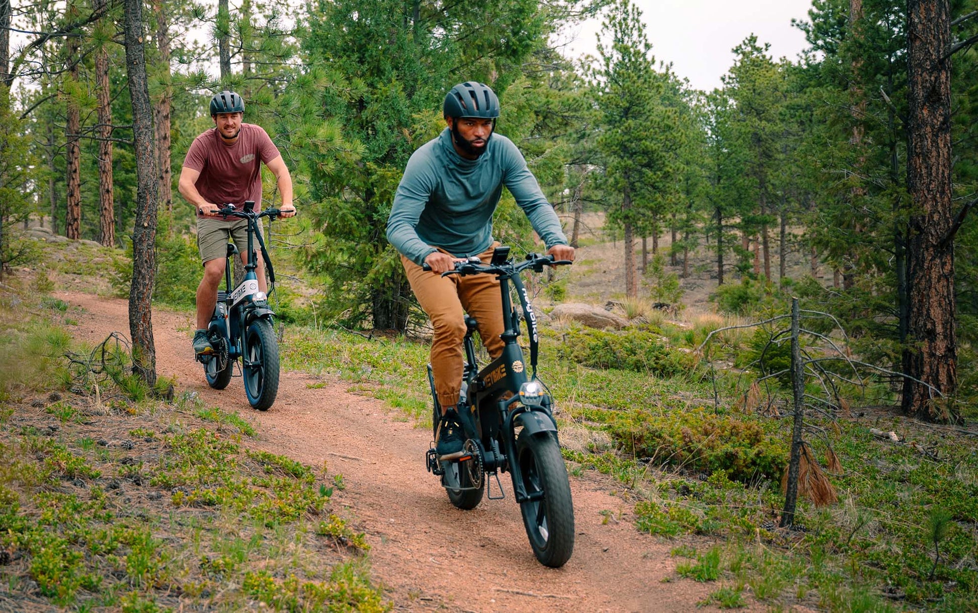 HEYBIKE Tyson e-bike in use on forest trail for off-road riding.