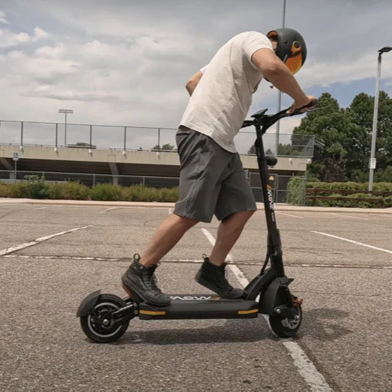 EMOVE Cruiser V2 all-wheel drive electric scooter with dual motors and hydraulic brakes on rugged terrain