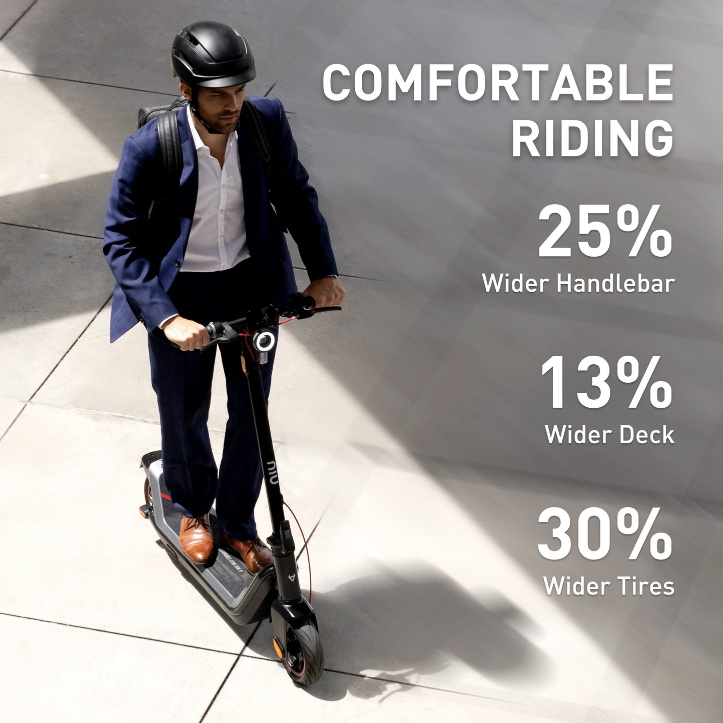 NIU KQI AIR electric kick scooter featuring wider handlebar, deck, and tires for comfortable riding.