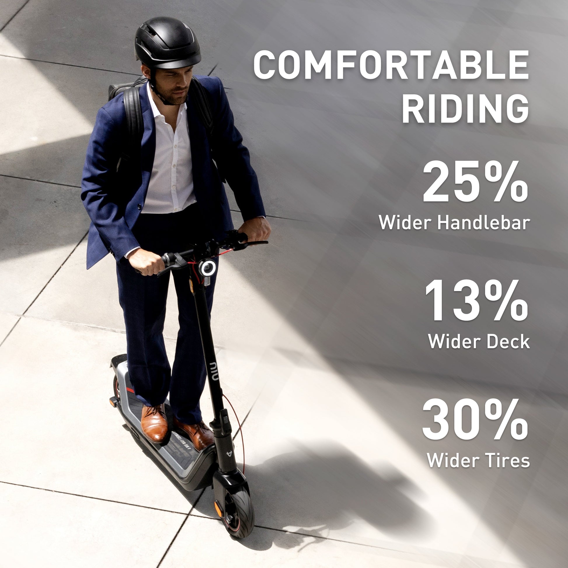 NIU KQI AIR electric kick scooter featuring wider handlebar, deck, and tires for comfortable riding.
